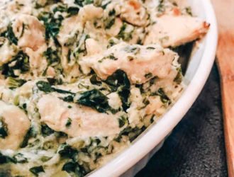 Spinach Artichoke Chicken Casserole is the perfect chicken, spinach and artichoke recipe. If you are a fan of spinach stuffed chicken breast but are running short on time, then this chicken and spinach casserole is perfect! My whole family loves it, and tells me it reminds them of our favorite Spinach Artichoke dip!