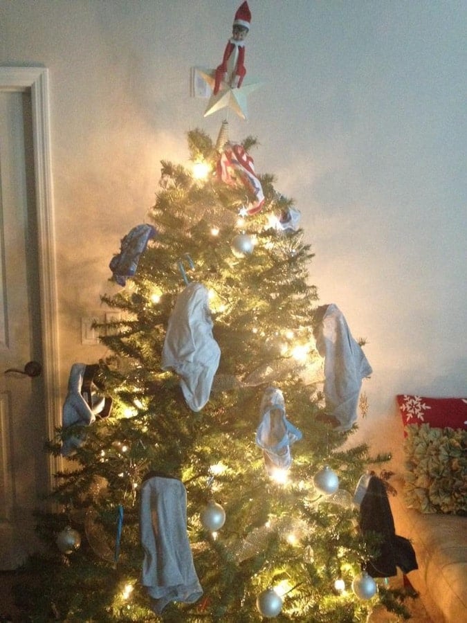 elf on the shelf ideas for toddlers - elf hangs underwear on the tree
