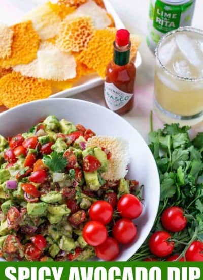 WOW Your family and friends with this amazing spicy avocado dip! A simple dip recipe, made with fresh ingredients including avocados and tomatoes. Perfect for taco night dinner or a game day snack! #SavorWinningFlavors #AvocadosFromMexico #HAVEARITA AND #FlavorYourWorld