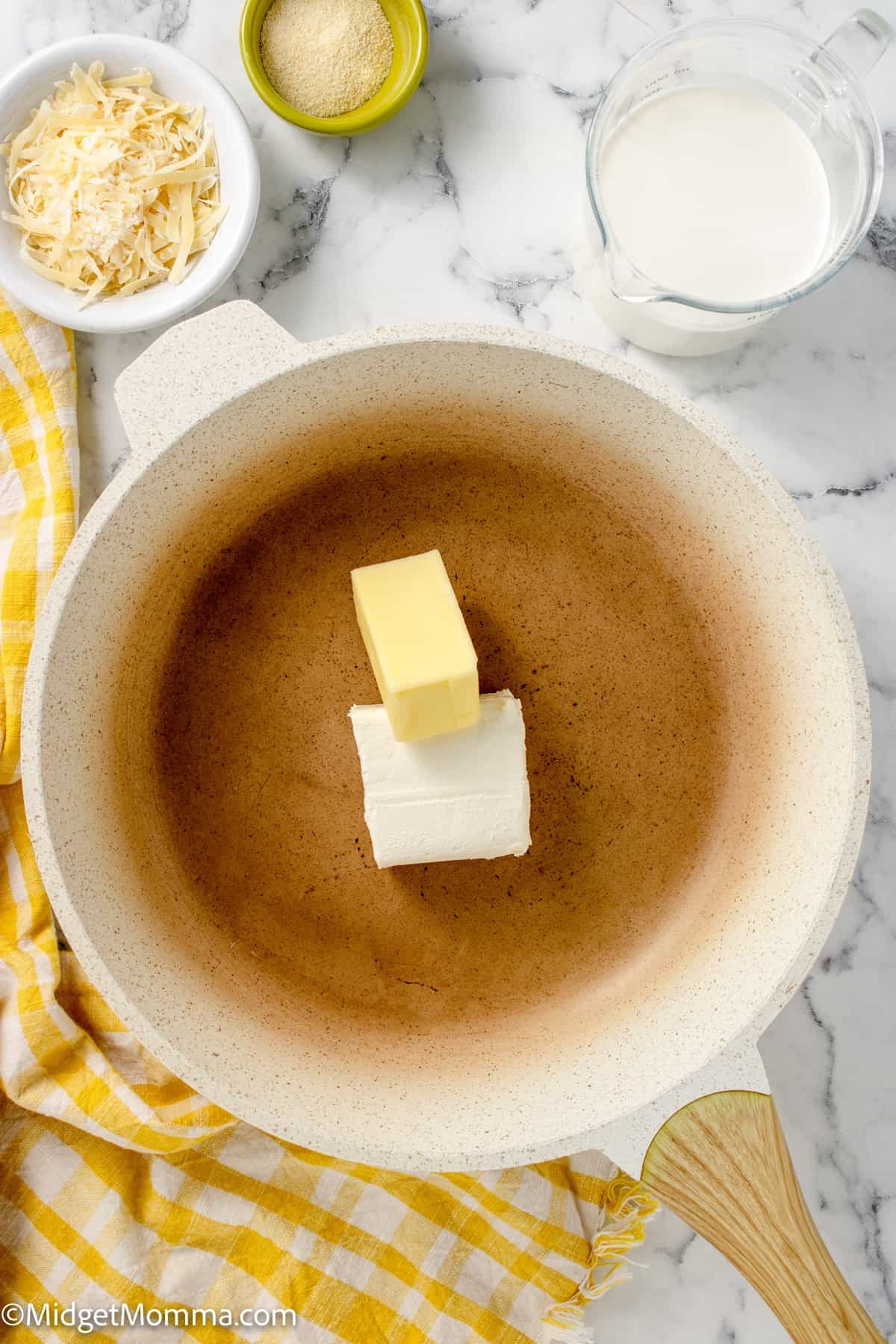 butter and cream cheese in a skillet on the stove