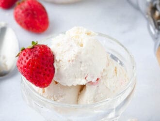 a bowl of strawberry vanilla keto ice cream