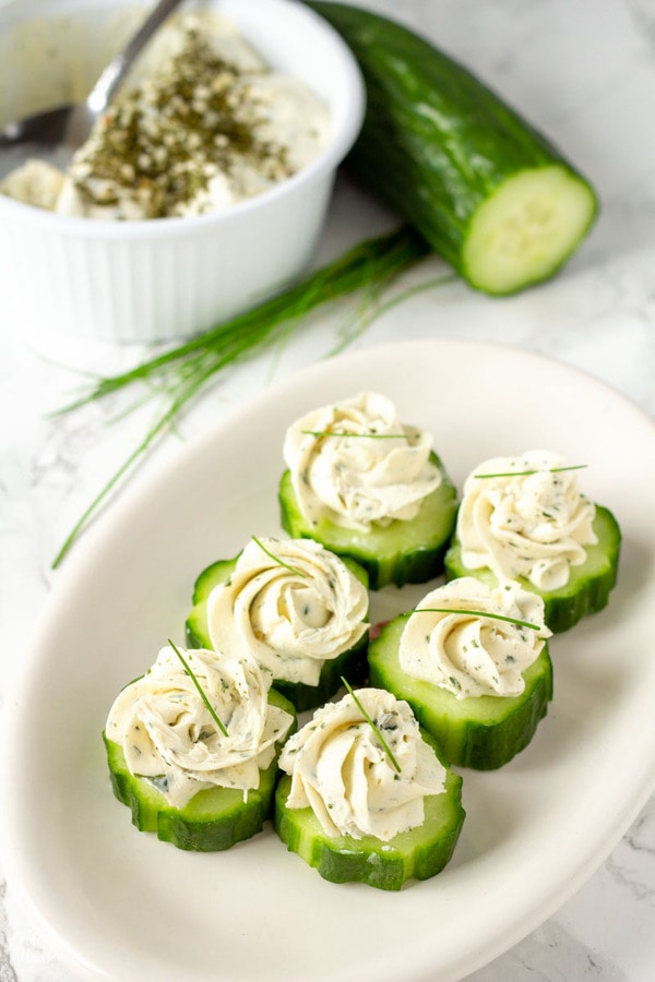 Cucumber Slices With Herb & Garlic Cheese. An easy Keto and Low Carb lunch or appetizer recipe that is quick to make and super tasty! #Keto #LowCarb #Appetizer 