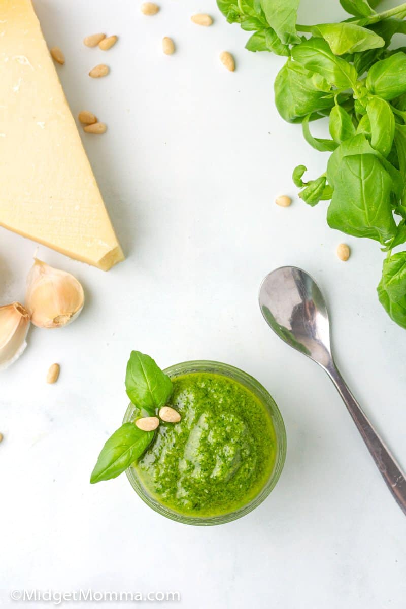 over head shot of homemade pesto in a jar