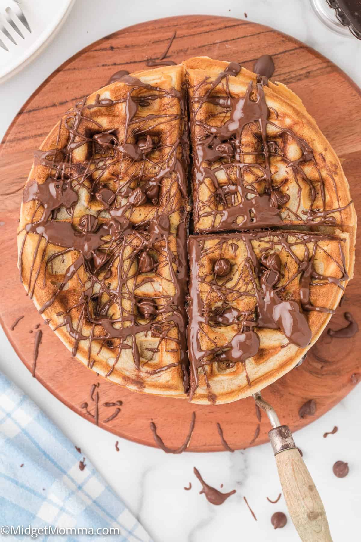overhead photo of full chocolate chip waffle with melted chocolate on top