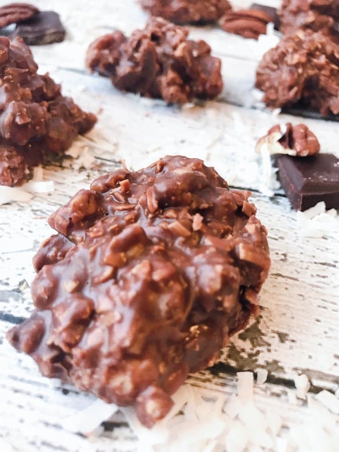 Low Carb Chocolate Peanut butter Coconut Pecan Cookies on a plate.