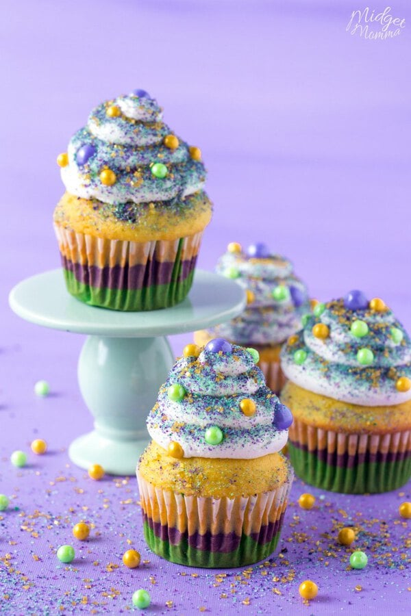 Homemade Mardi gras cupcakes on a cake stand