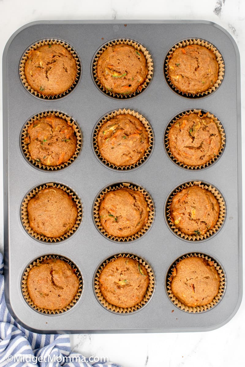 Zucchini Carrot Muffins in a muffin pan