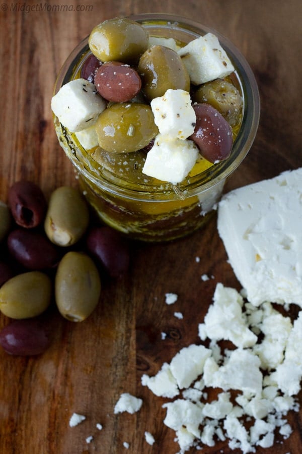 Greek Marinated Olives with Feta Cheese. A delicious mediterranean diet inspired appetizer or snack, that is also low carb, these marinated olives and feta cheese are perfect for anyone who is looking for a tasty easy recipe.