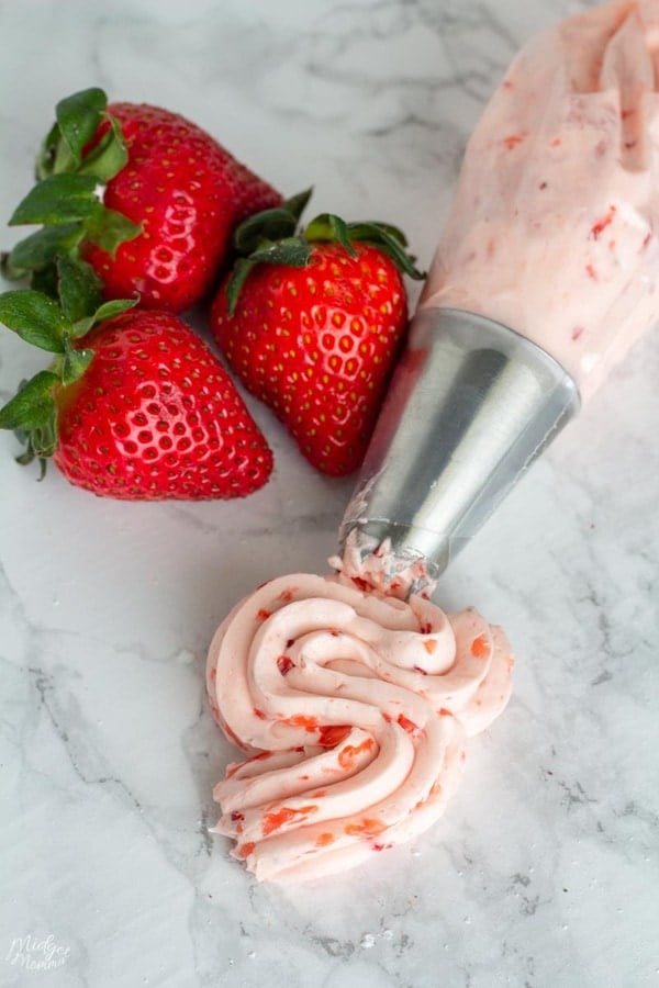 Low Carb sugar free strawberry buttercream made with fresh strawberries in a piping bag