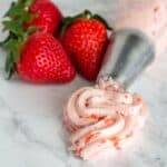 piping bag filled with keto friendly strawberry buttercream frosting
