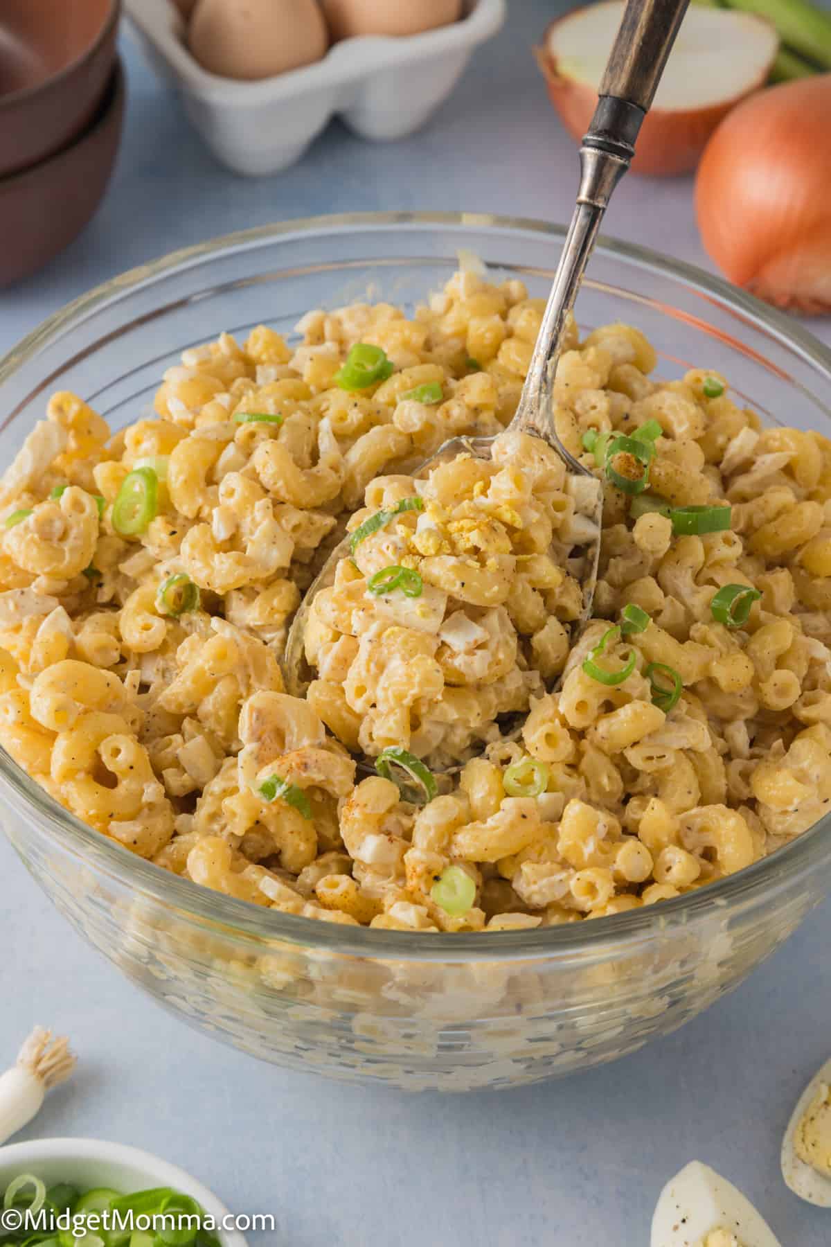 side view of a large serving bowl of Deviled Egg Pasta Salad Recipe