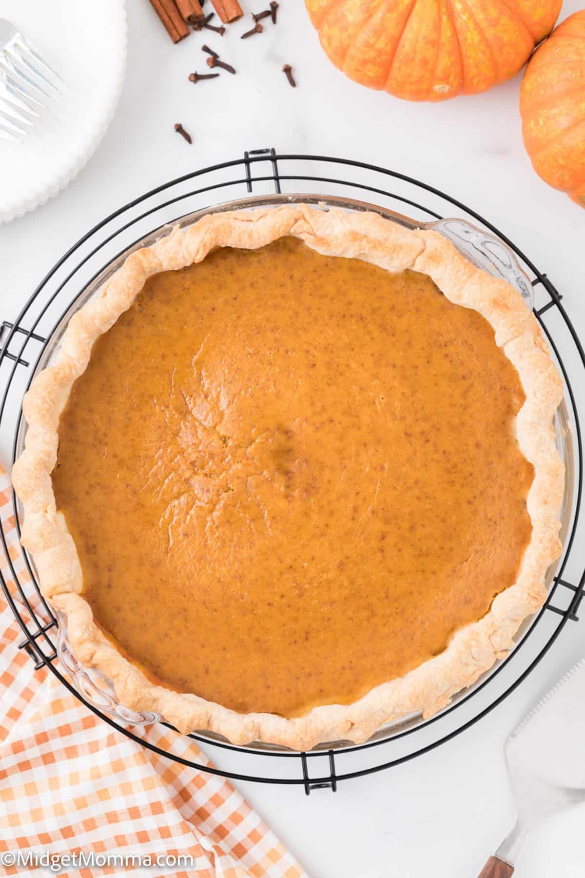 homemade pumpkin pie in a pie dish.