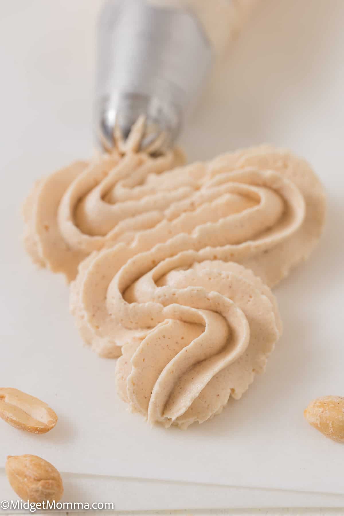close up photo of a Peanut butter buttercream frosting recipe swirl