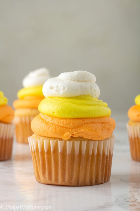 Candy Corn Cupcakes are easy to make Halloween cupcakes made with vanilla buttercream to look just like a giant candy corn.