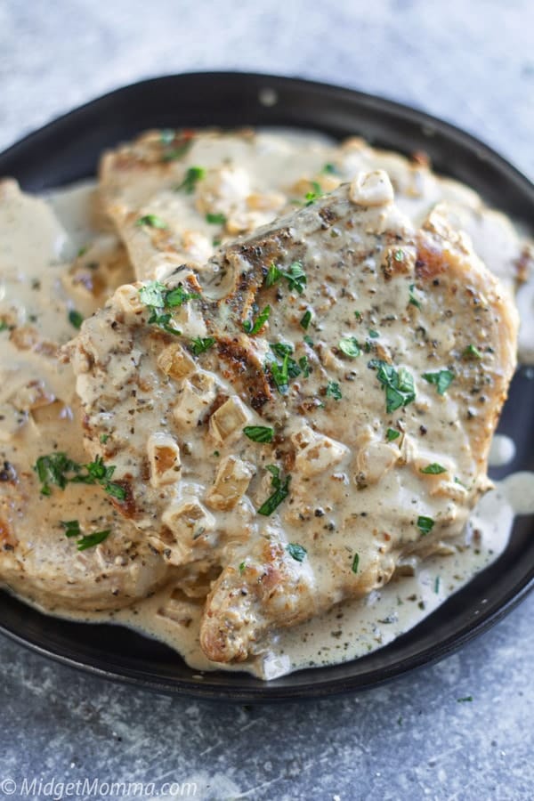Creamy Roasted Garlic Parmesan Pork Chops Recipe • MidgetMomma