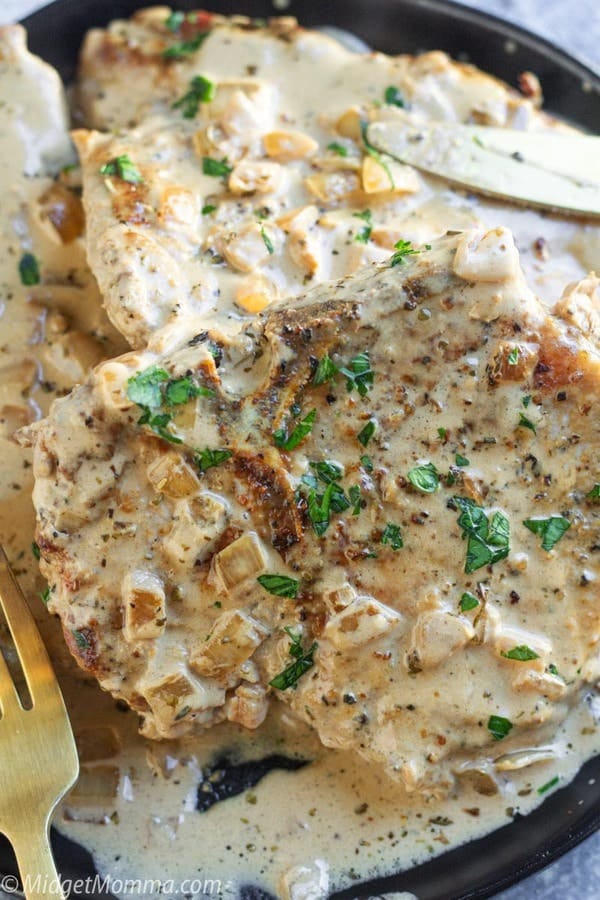 Creamy Roasted Garlic Parmesan Pork Chops Recipe • MidgetMomma