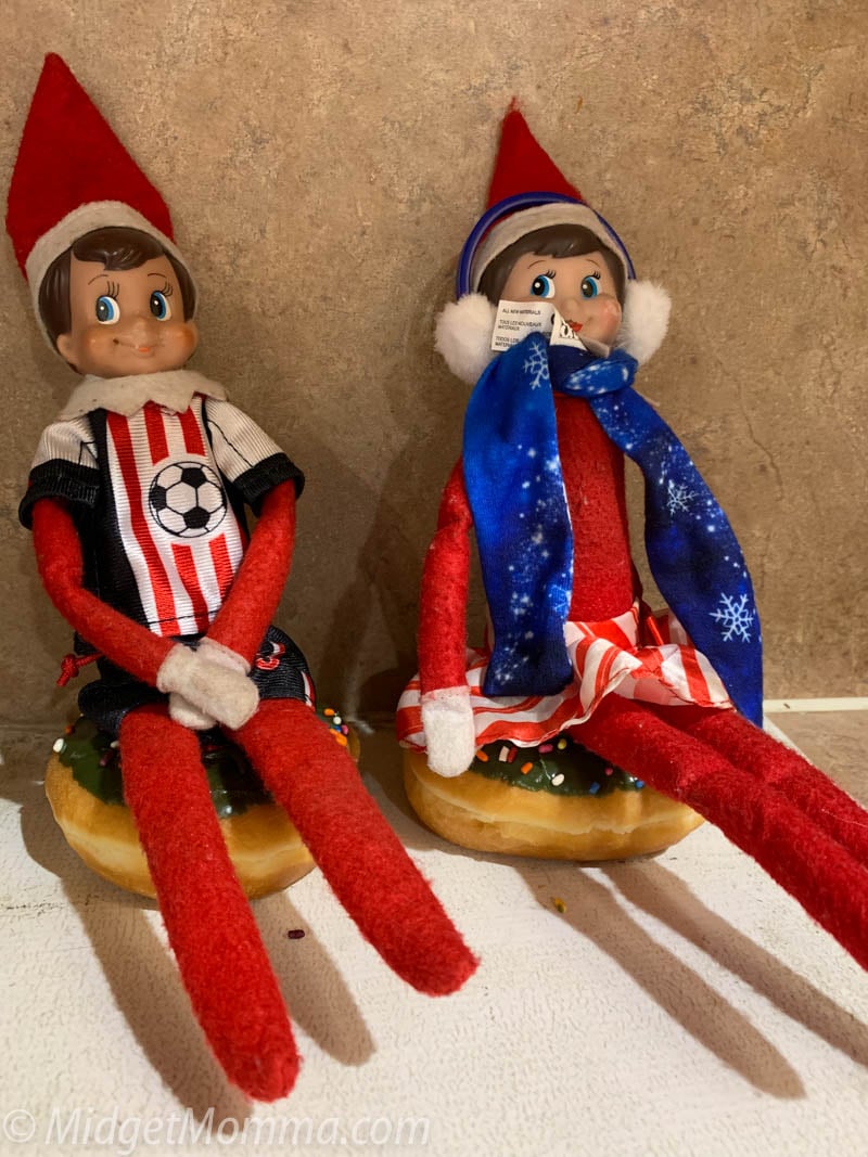 elf on the shelf tubing with a donut