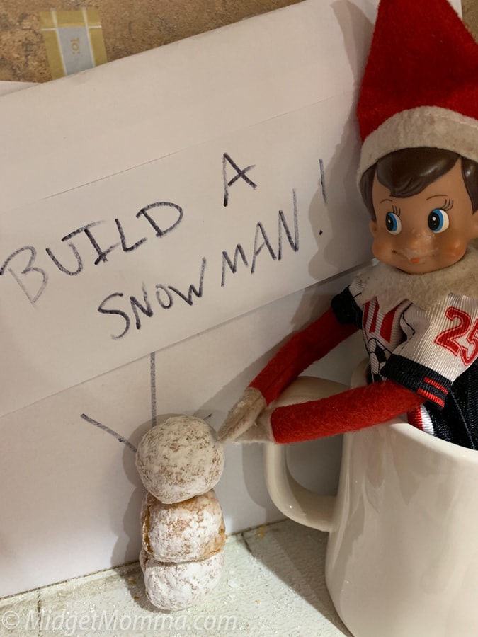 build-a-snowman elf on the shelf idea with dunkin donuts munchkins