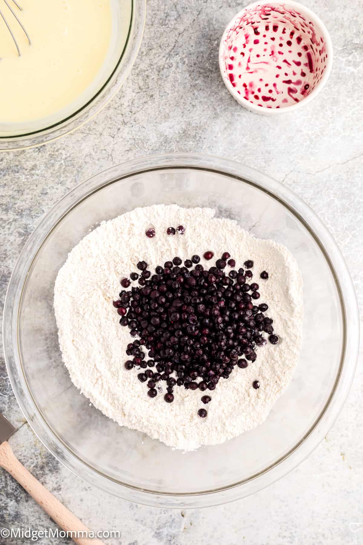 blueberries added to the bowl of dry ingredients