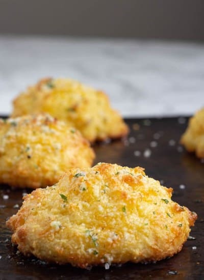 Keto Cheddar Bay Biscuits on a baking sheet