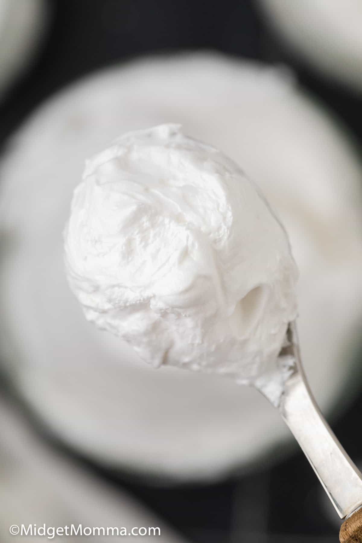 Homemade Marshmallow Fluff Recipe on a spoon