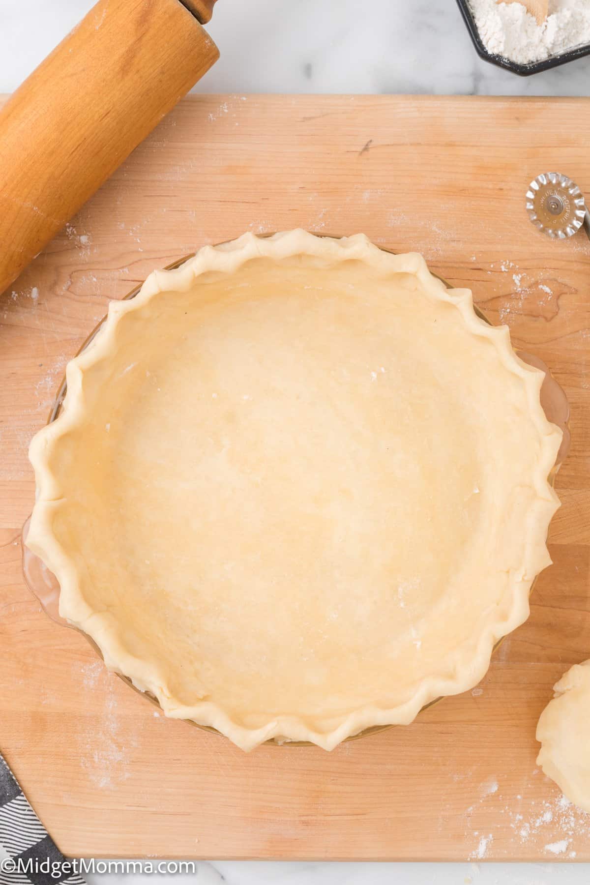 homemade pie crust in a glass pie dish