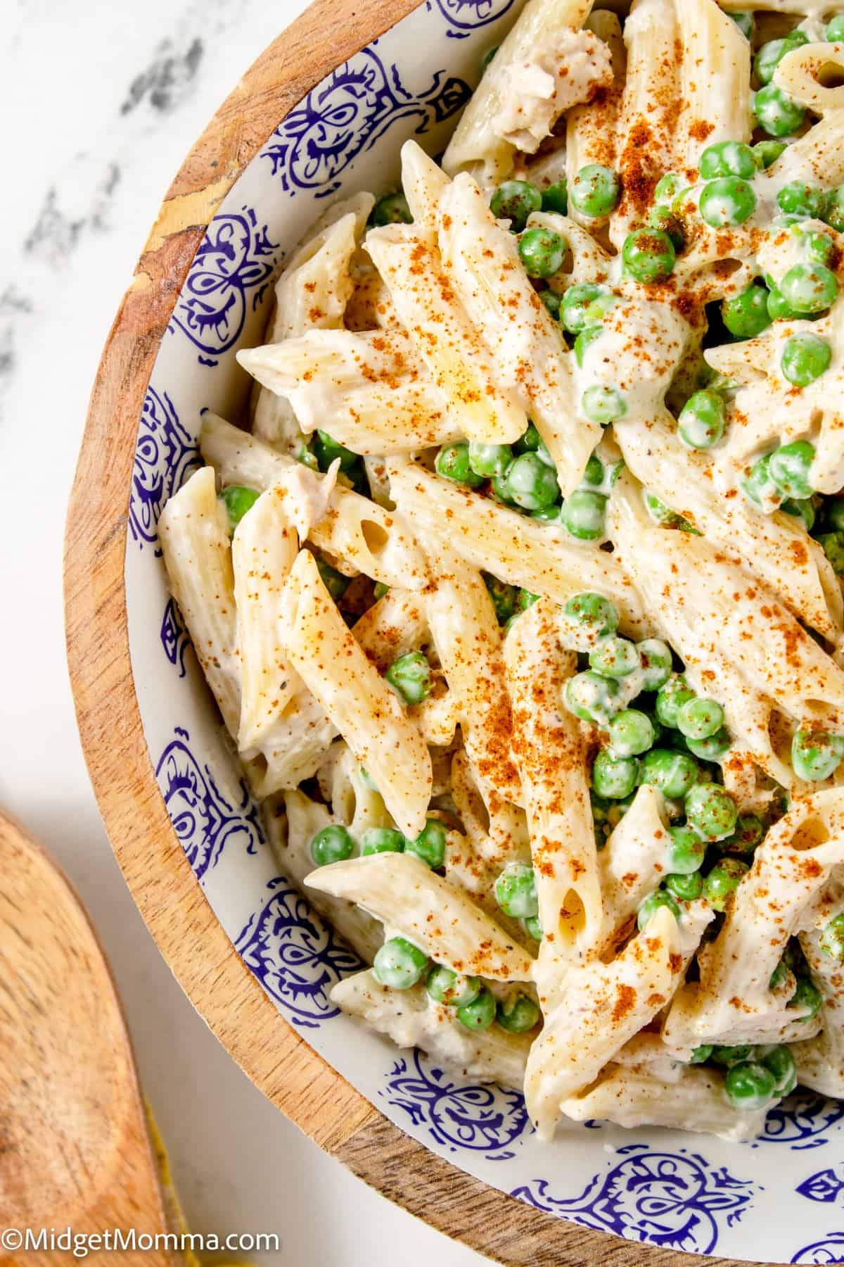 close up photo of tuna pasta salad in a serving dish