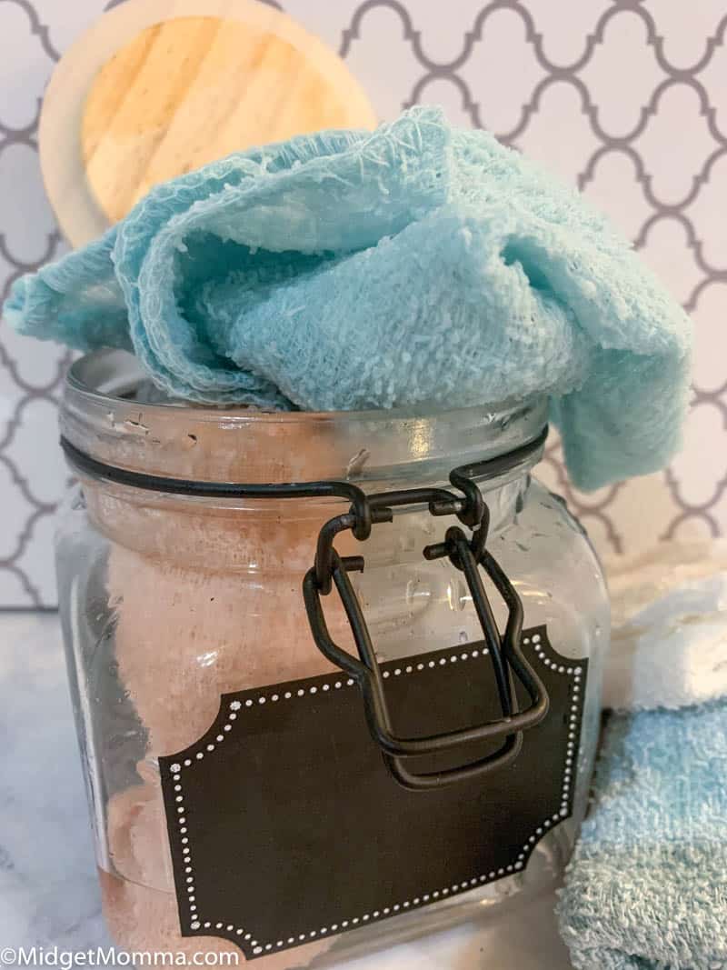 Homemade disinfecting wipes in a glass jar