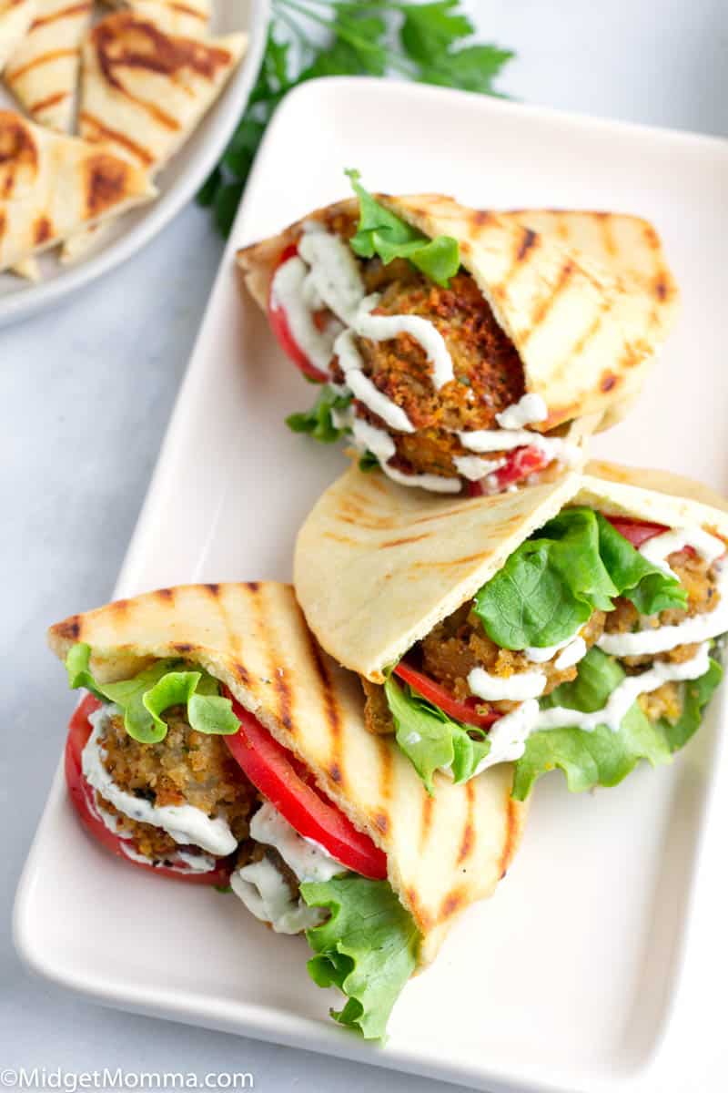 Falafel Wraps with Tzatziki Sauce on a platter