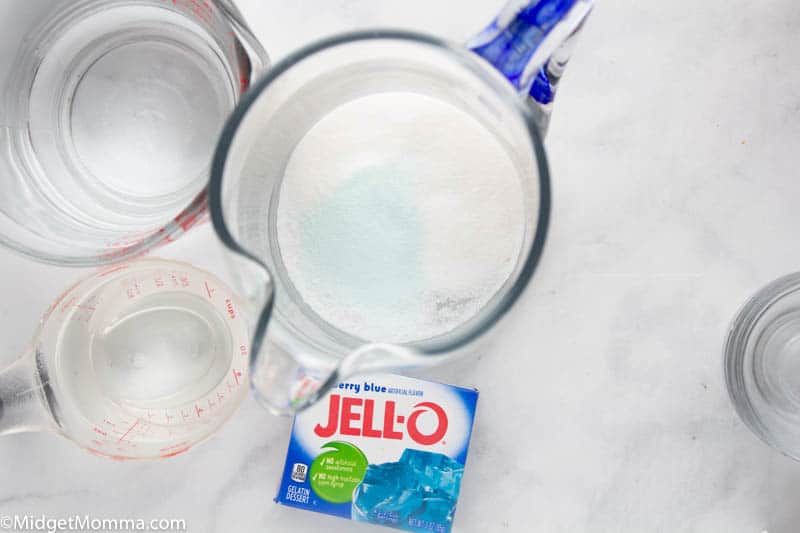dry ingredients for Homemade Blue Raspberry Pedialyte in a pitcher