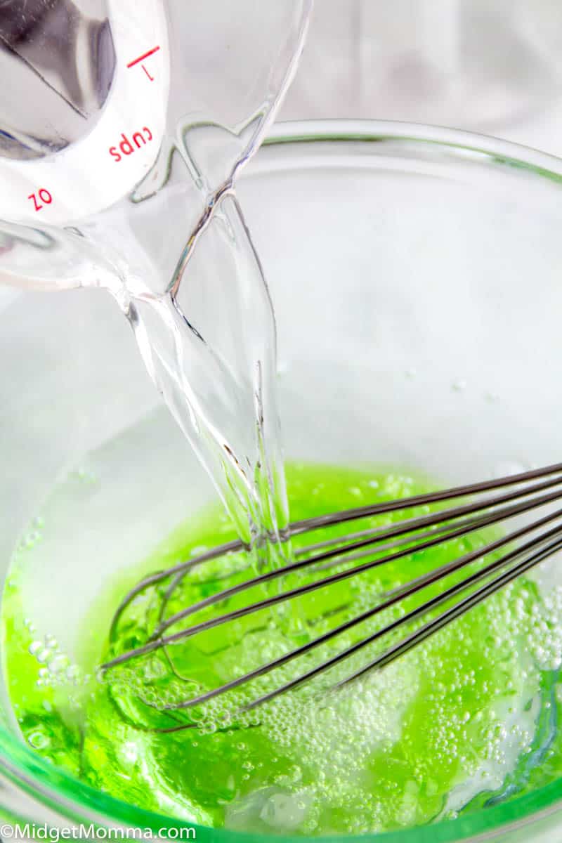 bowl of aloe vera gel with rubbing alcohol being mixed in