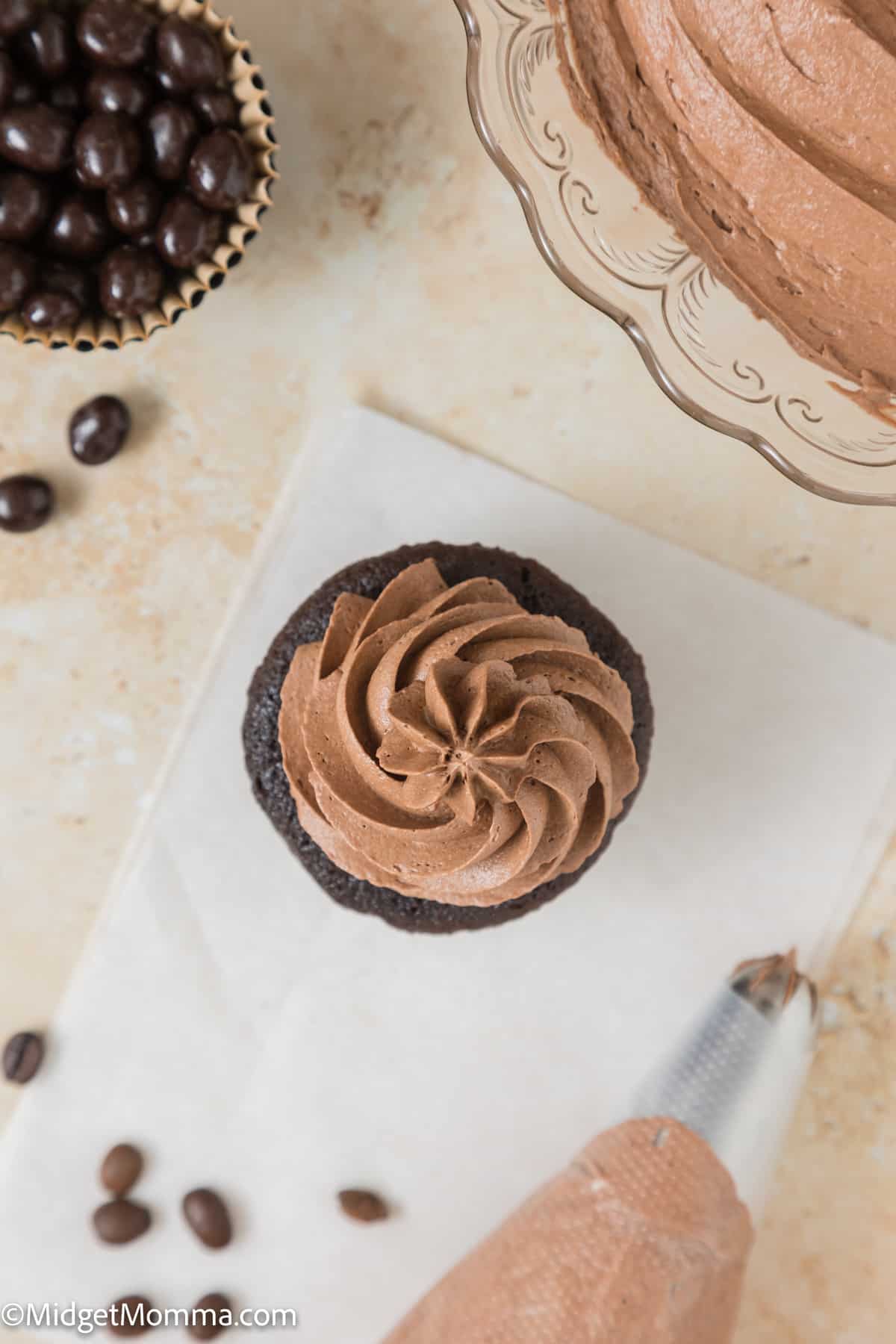 Mocha Buttercream Frosting Recipe on top of a chocolate cupcake