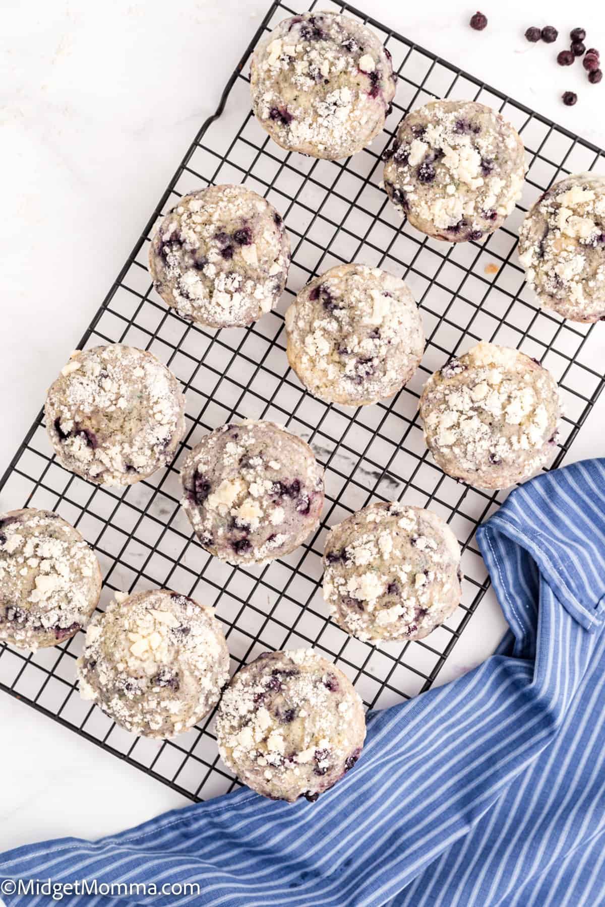 Blueberry Streusel Muffins on a wire baking rack