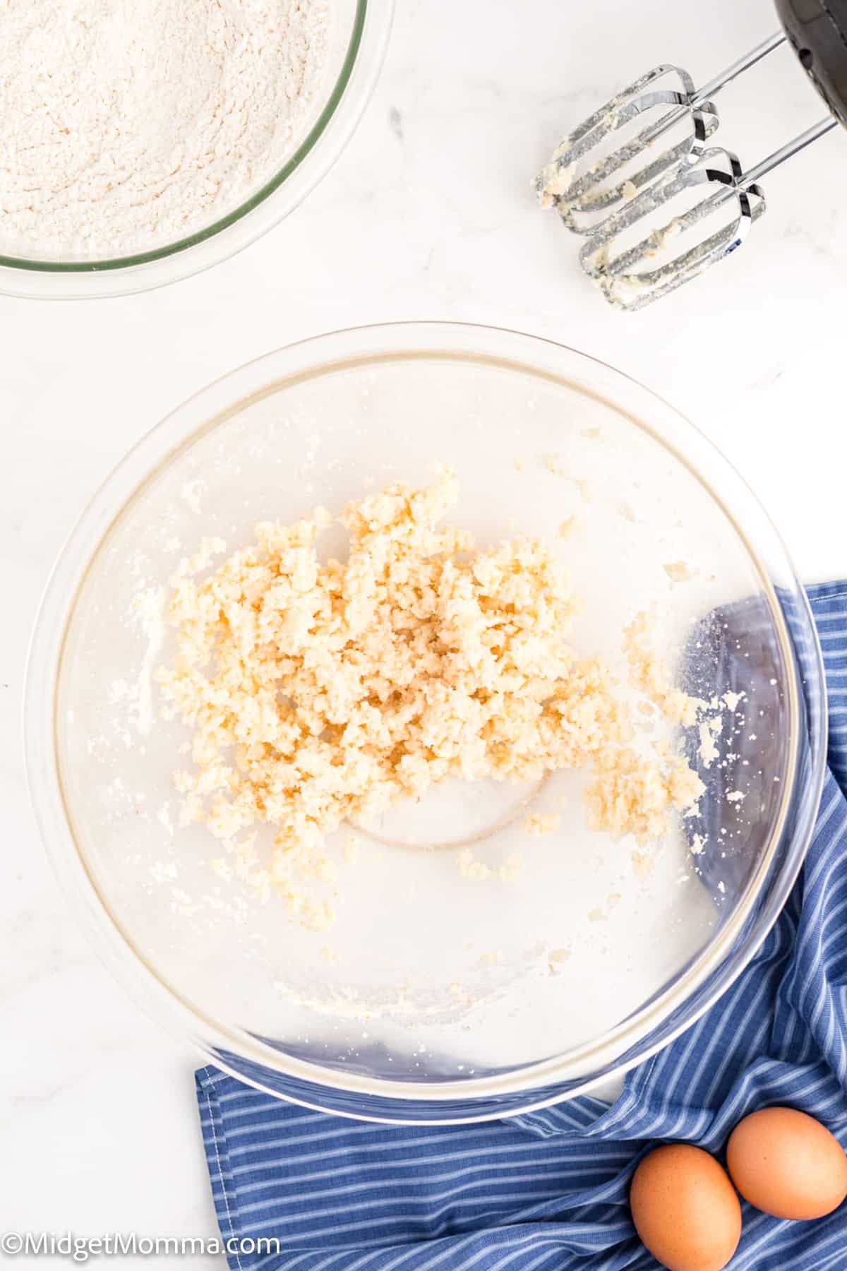 crumb topping for Blueberry Streusel Muffins Recipe being mixed in a bowl