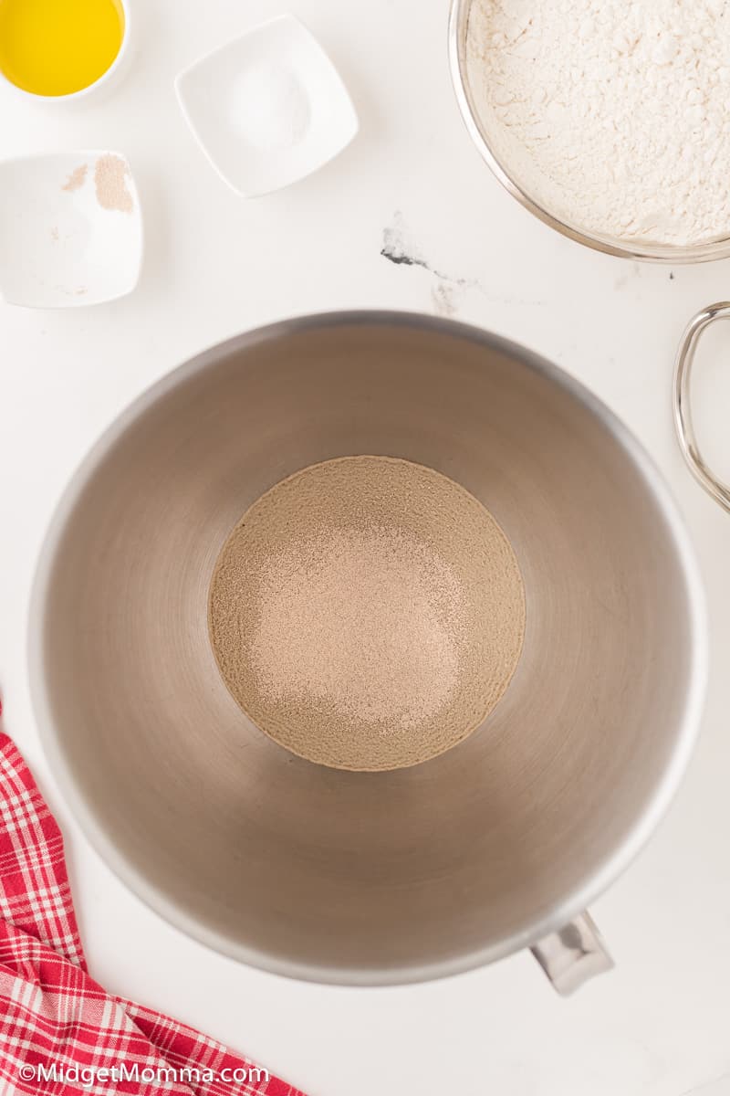 yeast and water in a mixing bowl