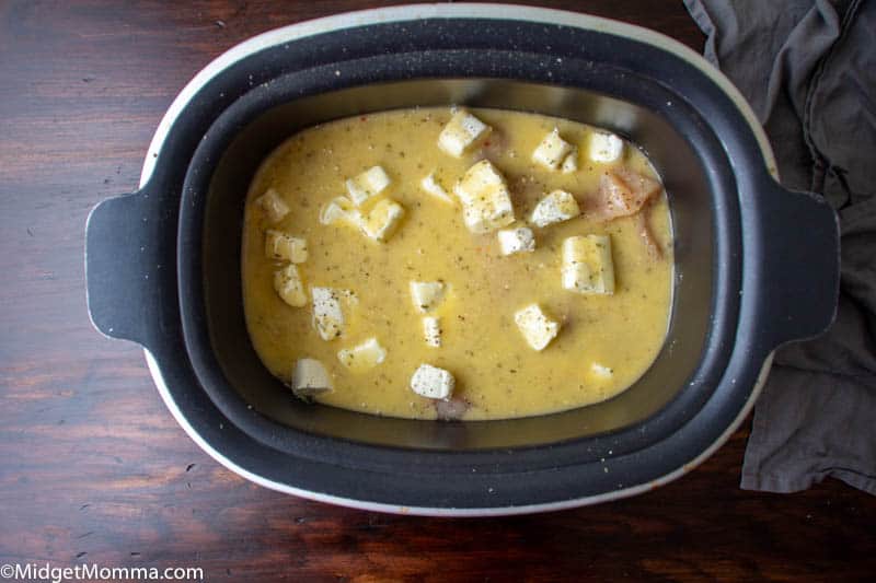 chicken and ingredients in cooking bowl