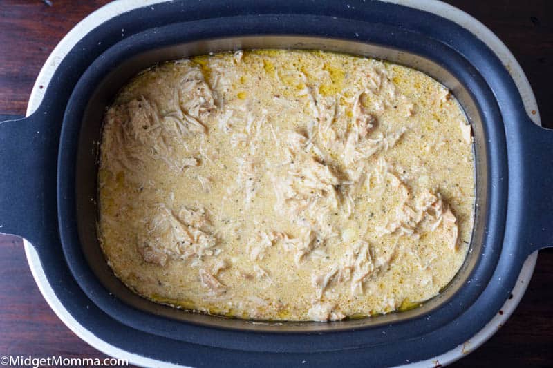 chicken and ingredients in cooking bowl