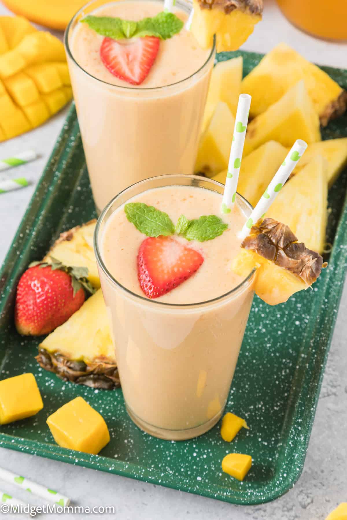 overhead photo of Tropical Mango Pineapple Fruit Smoothie in glasses