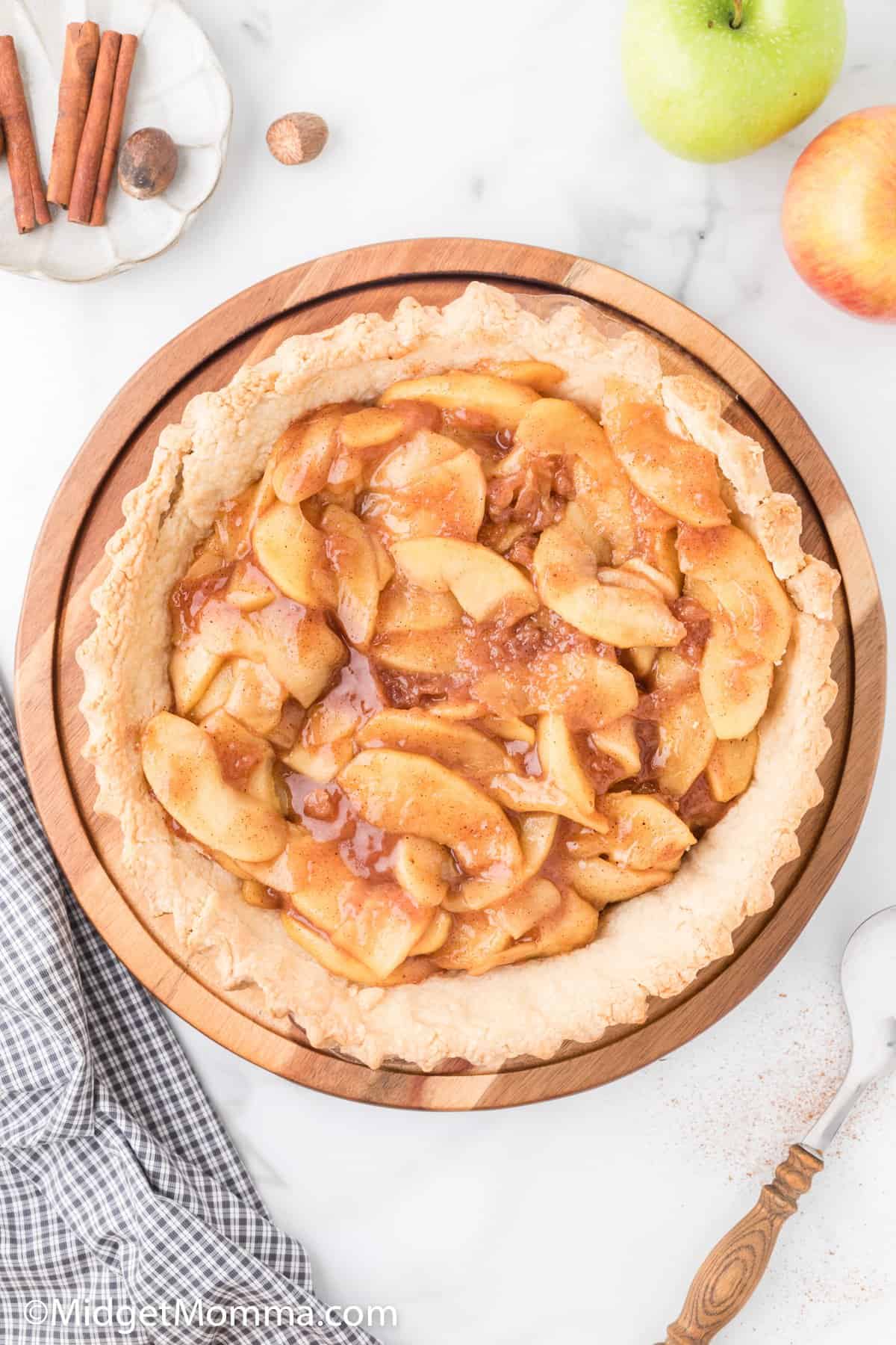 homemade apple pie filling in a pie crust