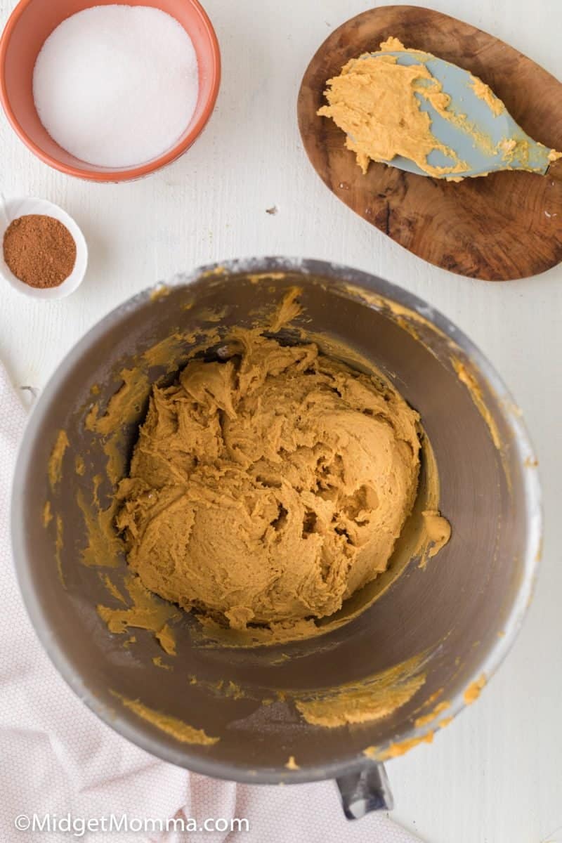Pumpkin Snickerdoodle Cookie recipe being mixed together  in a mixing bowl