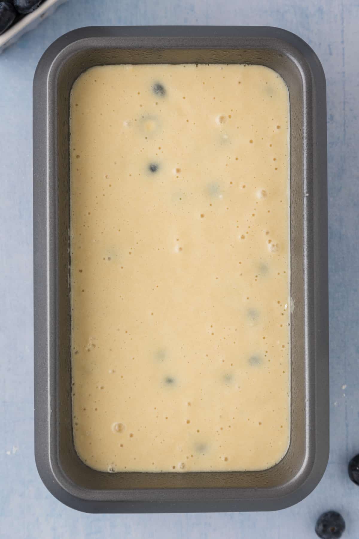 blueberry bread batter in a pan.