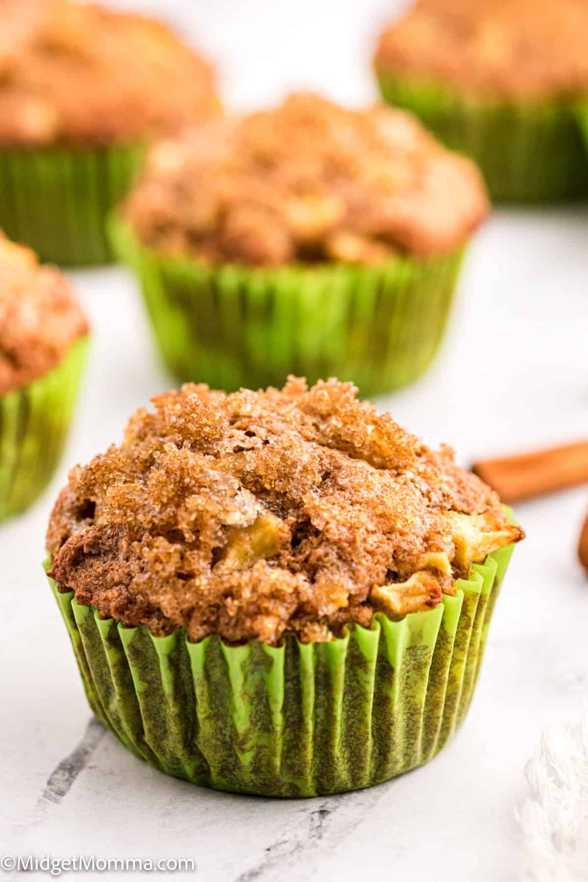 apple cinnamon muffin in a muffin wrapper