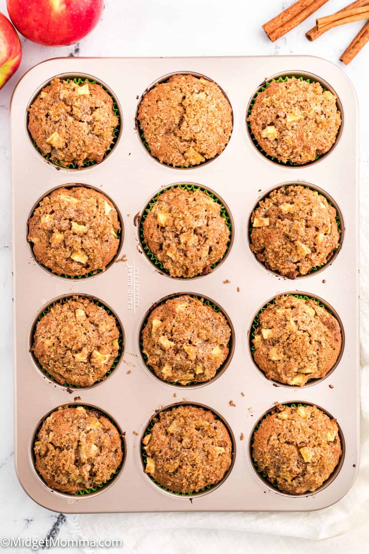 overhead photo of Whole Wheat Apple Cinnamon Muffins in a muffin tin