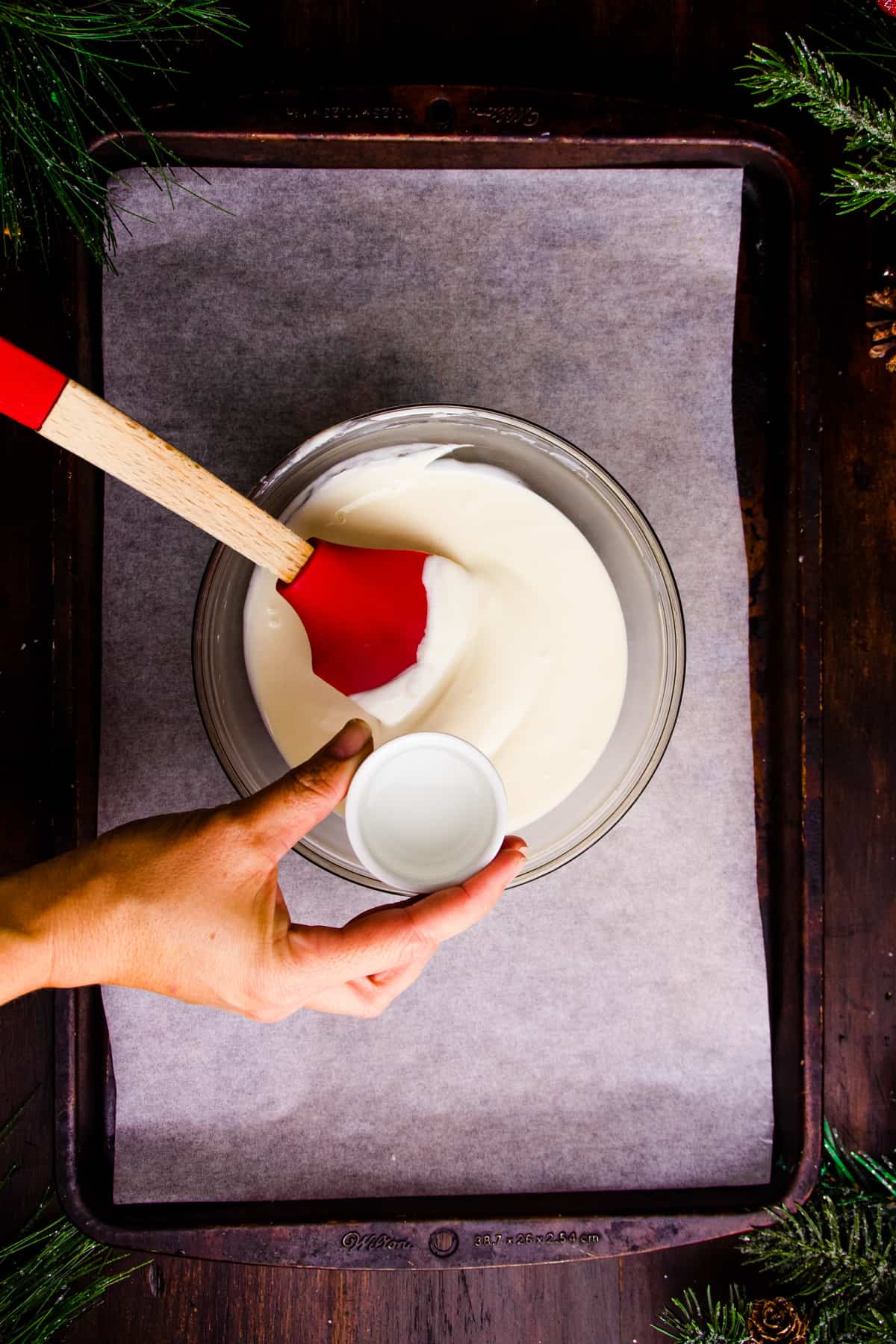 melted white chocolate with peppermint extract being added