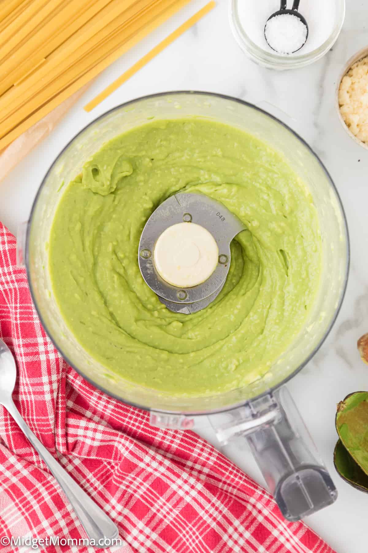 olive oil, avocado, garlic, salt, and lemon juice creamed into a sauce in a food processor