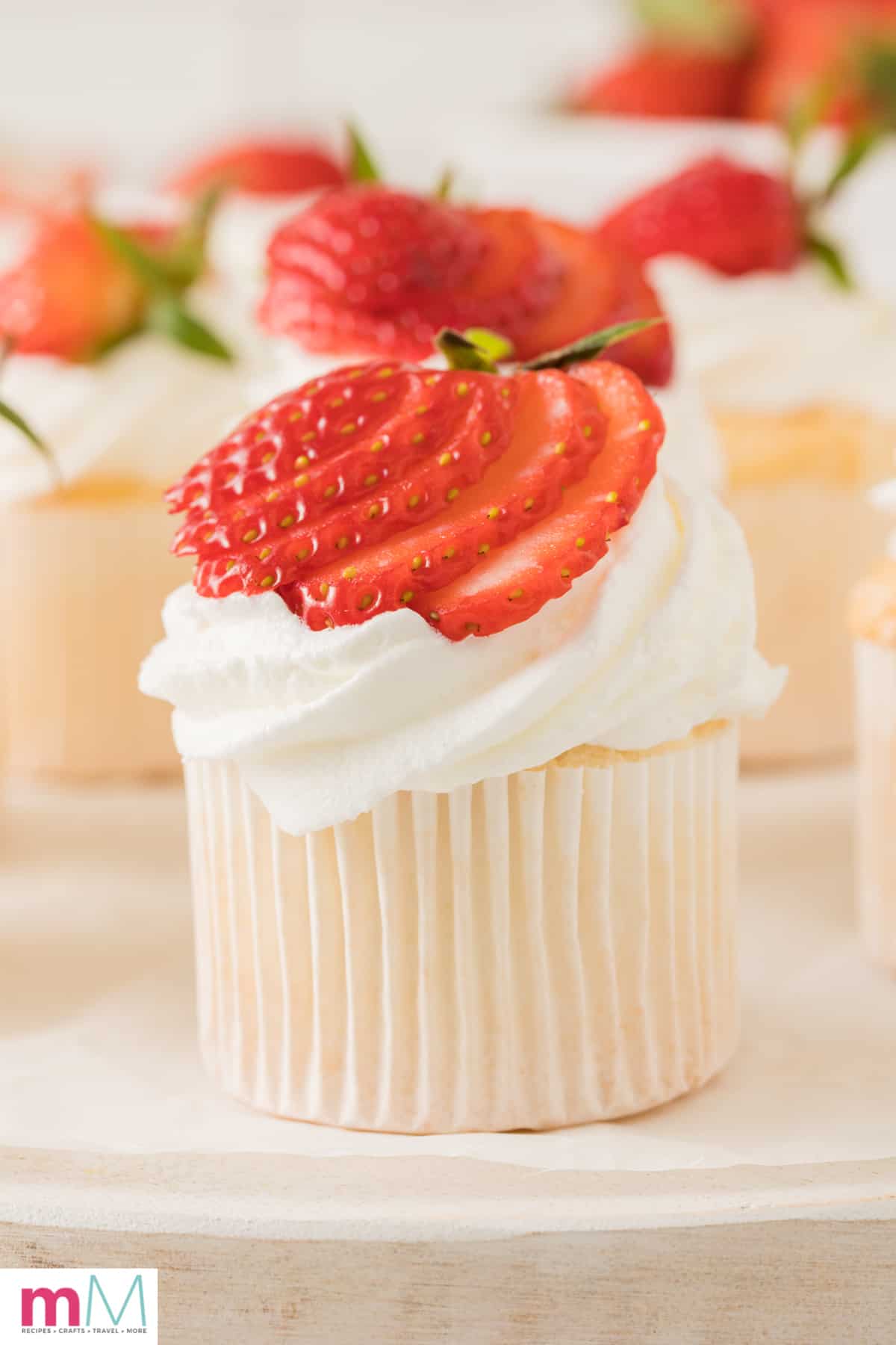 close up photo of angel food cupcake on a plate