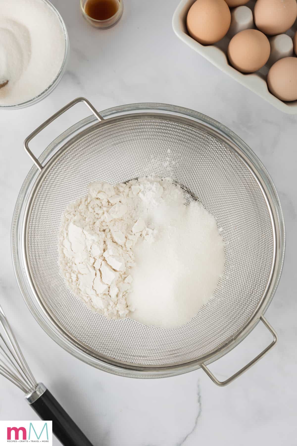 salt, flour, cream of tarter, and sugar being sifted into a mixing bowl.