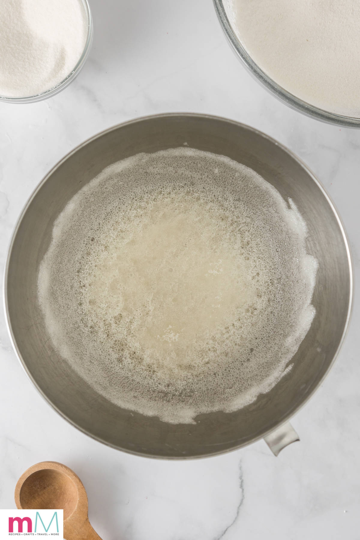 first whip of egg whites, water and sugar in a mixing bowl