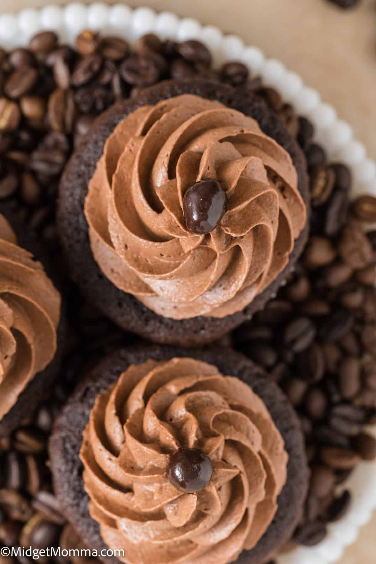 overhead photo of 2 mocha cupcakes on a plate