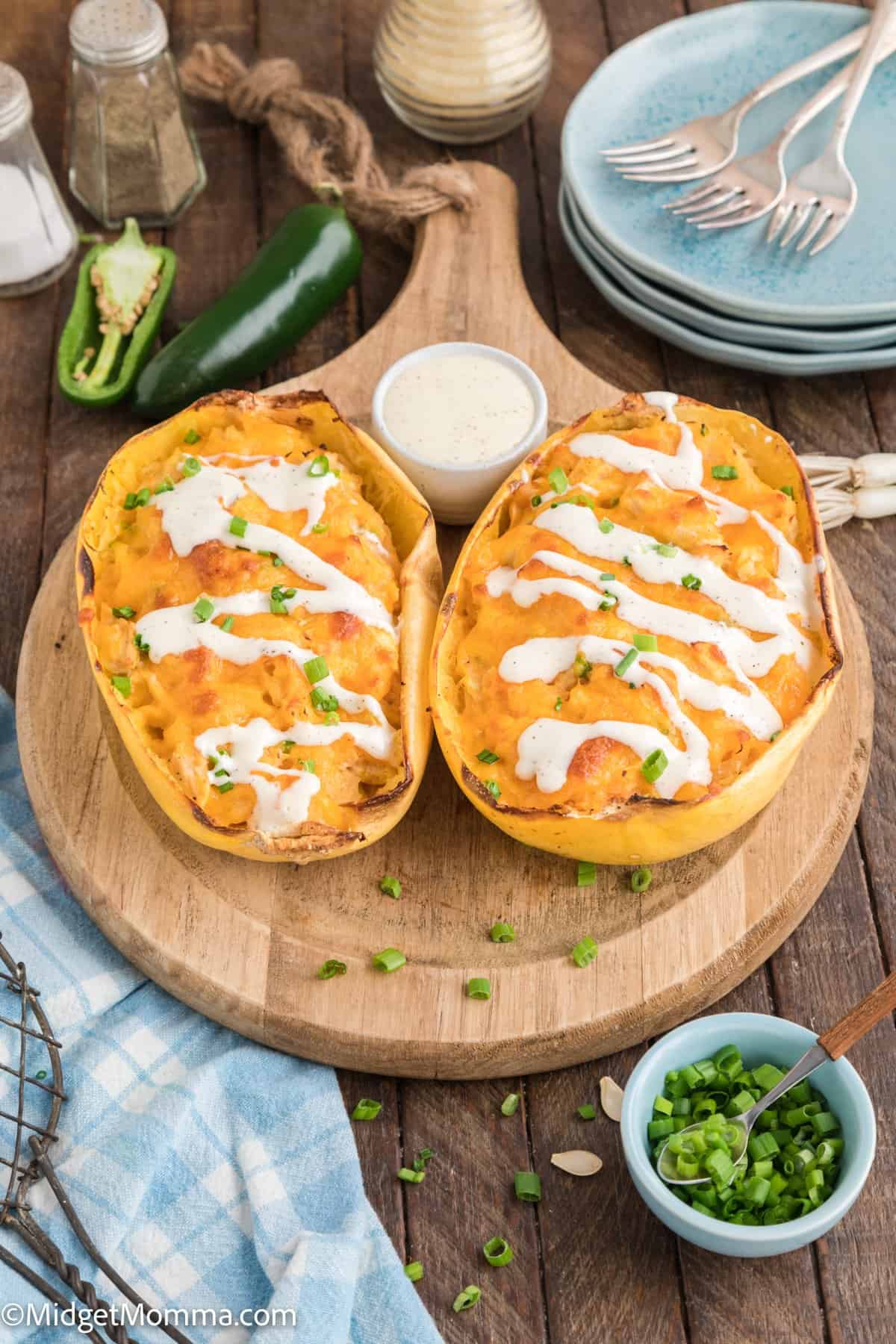 front view of buffalo chicken spaghetti squash recipe on a serving tray